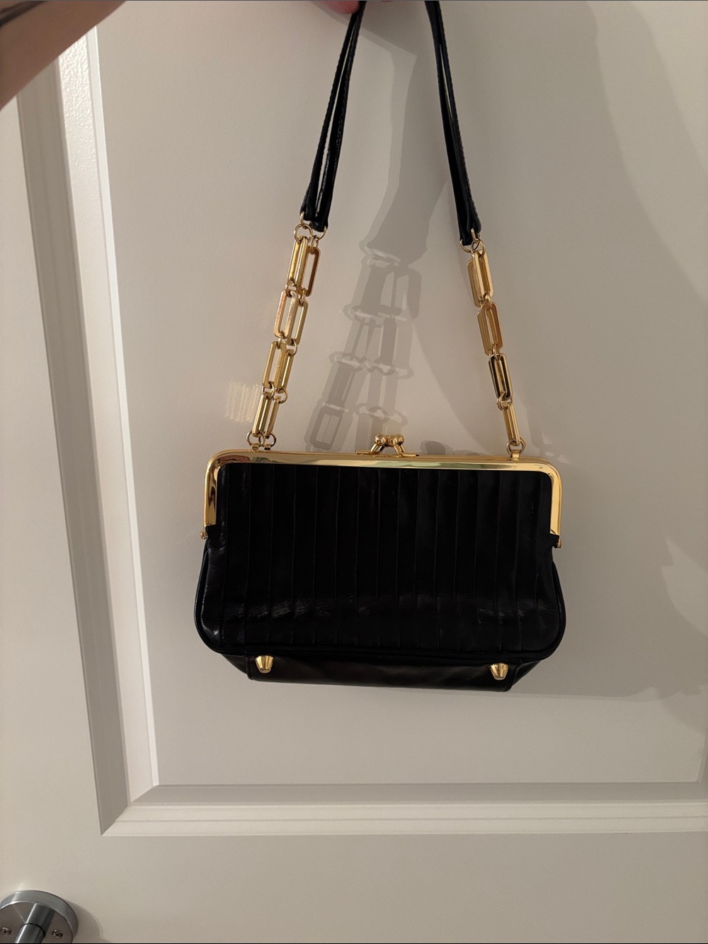 Classic Black Leather Frame Shoulder Bag with Gold Accents